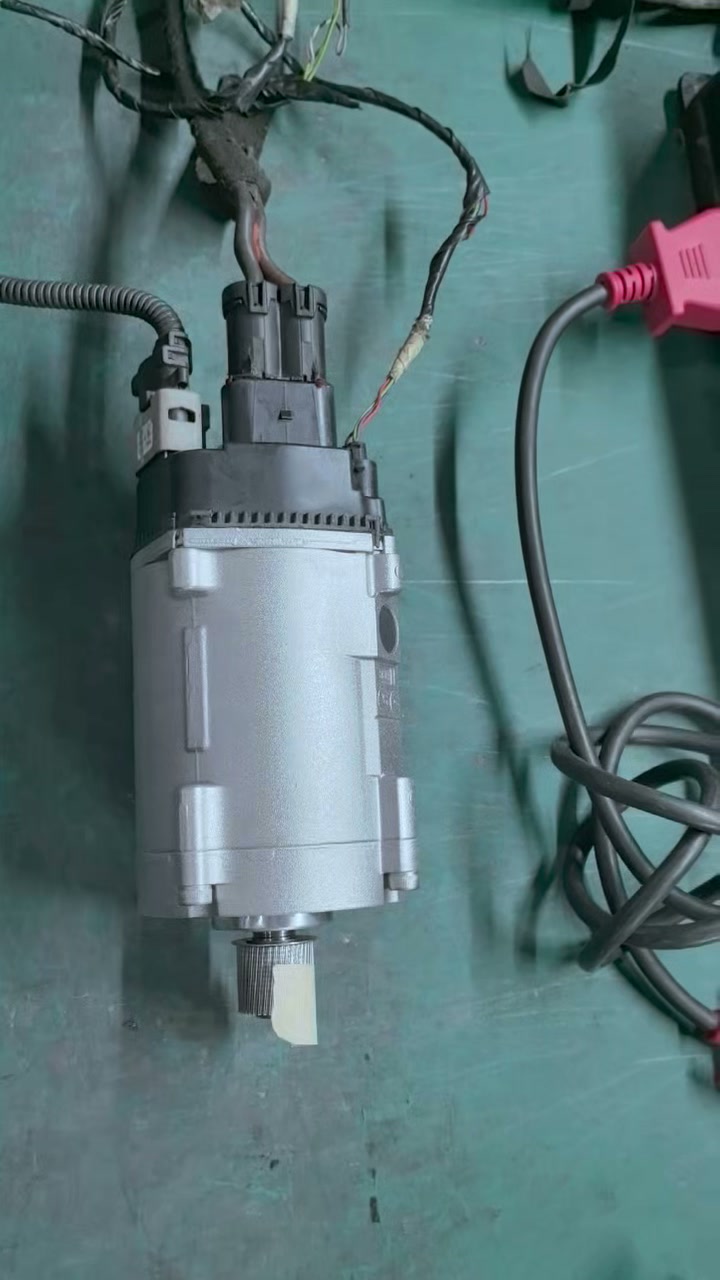 BMW F30 electric power steering motor on a bench with the output-shaft tape marker in position A